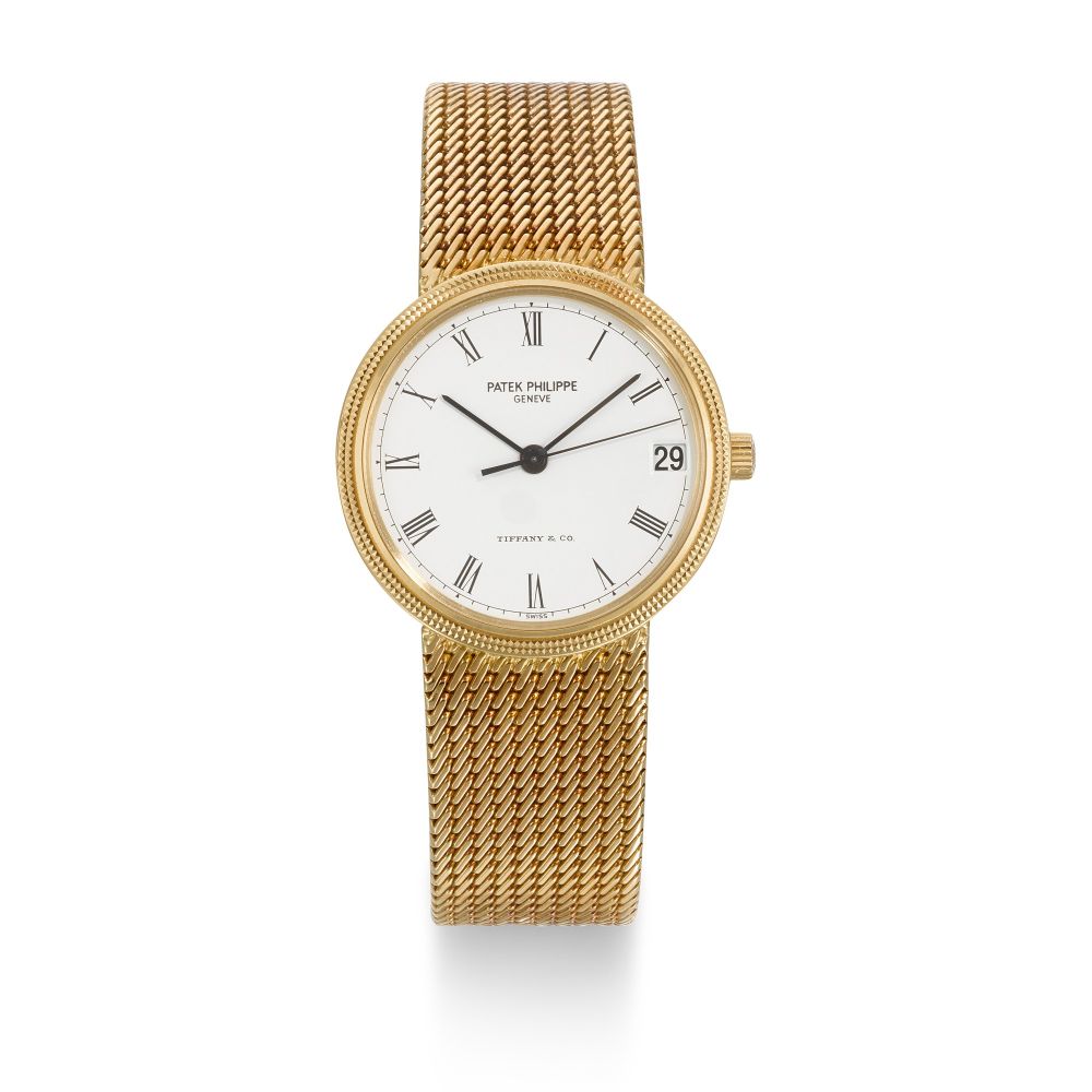 PATEK PHILIPPE | CALATRAVA DOUBLE-SIGNED TIFFANY & CO, REF 3802/205J, YELLOW GOLD BRACELET WATCH WITH DATE AND RETAILER SIGNATURE, CIRCA 2000