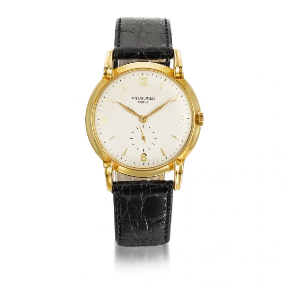 PATEK PHILIPPE | REF 2420 YELLOW GOLD WRISTWATCH WITH UNUSUAL LUGS MADE IN 1945