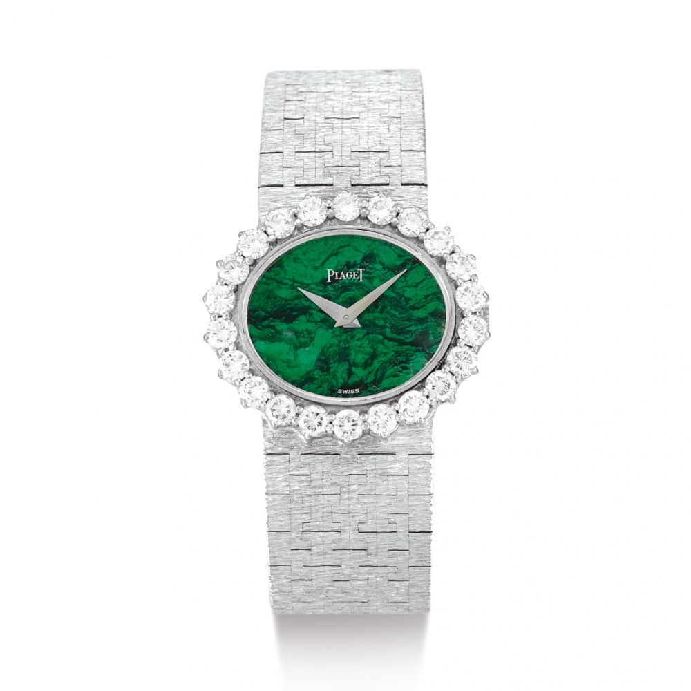 PIAGET | REFERENCE 9330 A6 A WHITE GOLD AND DIAMOND-SET BRACELET WATCH WITH MALACHITE HARDSTONE DIAL, CIRCA 1975 | 伯爵 | 型號9330 A6 白金鑲鑽石鏈帶腕錶，備孔雀石錶盤，錶殼編號135251，約1975年製