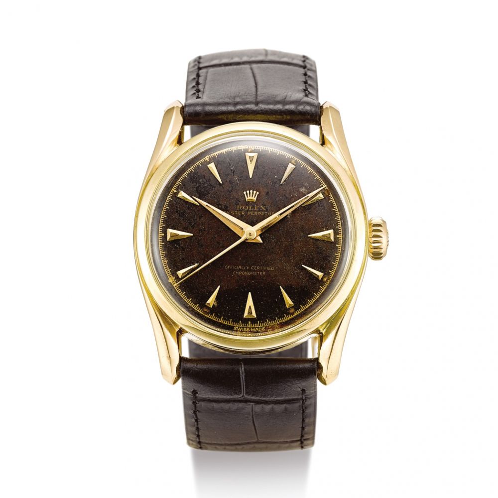 ROLEX | BOMBÉ, REFERENCE 6090 A YELLOW GOLD WRISTWATCH, CIRCA 1952 | 勞力士 | Bombé 型號6090 黃金腕錶，錶殼編號730102，約1952年製