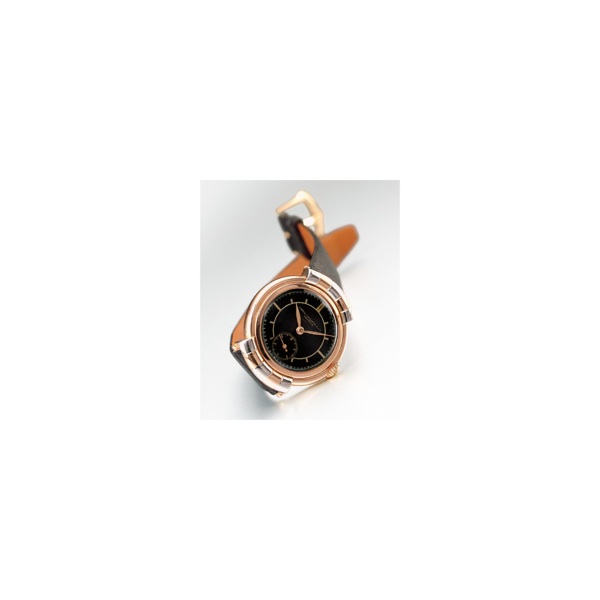 A RARE TWO COLOR GOLD WRISTWATCH WITH HOODED LUGS AND BLACK DIAL, PATEK PHILIPPE & CO., GEN