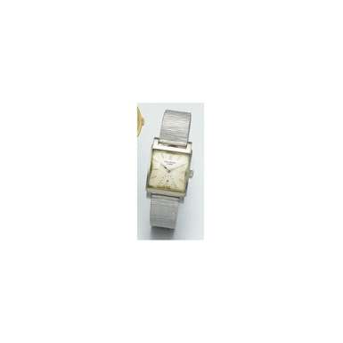 A FINE AND EXTREMELY RARE WHITE GOLD CURVED RECTANGULAR WRISTWATCH, PATEK PHILIPPE & CO., GEN