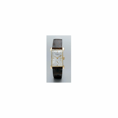 A FINE AND RARE PINK GOLD RECTANGULAR WRISTWATCH WITH UNUSUAL LUGS, PATEK PHILIPPE & CO., GEN
