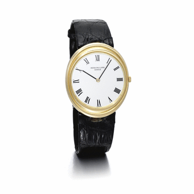 PATEK PHILIPPE - A RARE GOLD OVAL AUTOMATIC WRISTWATCH 1972 REF 3594J MVT 1282549 CASE 523714