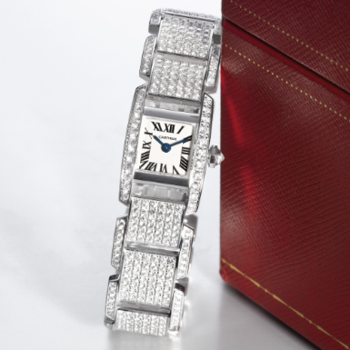 CARTIER - A LADY'S FINE WHITE GOLD AND DIAMOND-SET RECTANGULAR WRISTWATCH WITH BRACELET CIRCA 2005 TANKISSIME