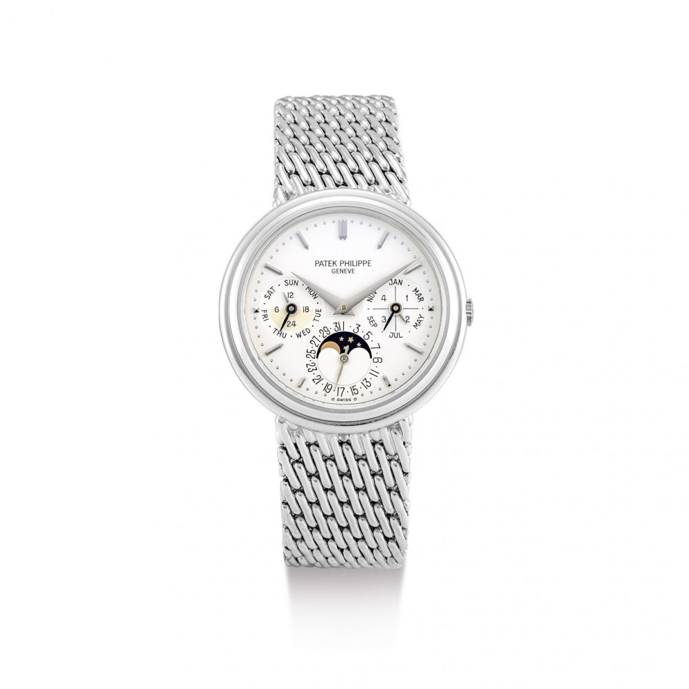 PATEK PHILIPPE | REFERENCE 3945/1, A WHITE GOLD PERPETUAL CALENDAR BRACELET WATCH WITH MOON PHASES, 24 HOUR AND LEAP YEAR INDICATION, CIRCA 1991 | 百達翡麗 | 型號3945/1 白金萬年曆鏈帶腕錶，備月相、24小時及閏年顯示，機芯編號772766，錶殼編號2875136，約1991年製