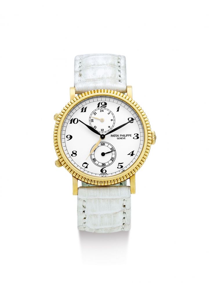 PATEK PHILIPPE | TRAVEL TIME, REFERENCE 5034, A YELLOW GOLD DUAL TIME ZONE WRISTWATCH WITH 24 HOURS INDICATION, CIRCA 2002