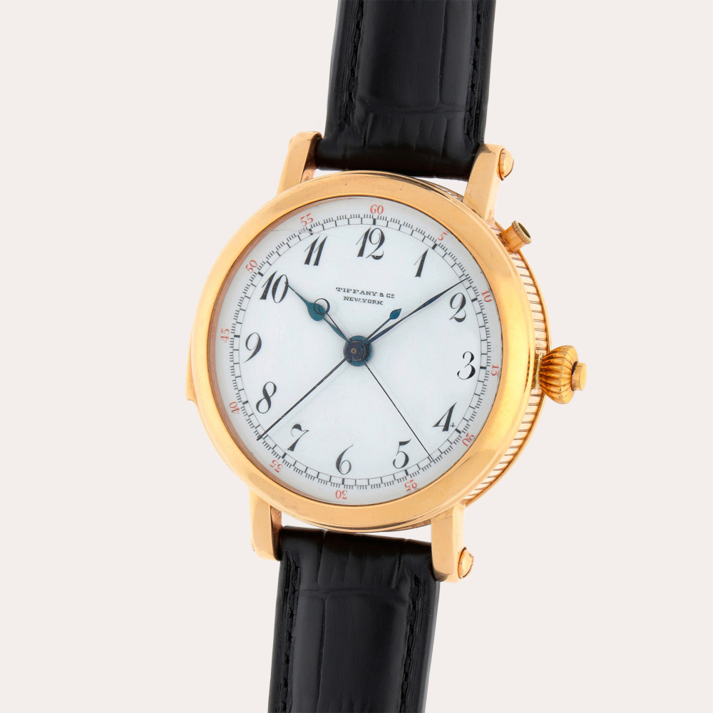 Tiffany & Co. A yellow gold minute repeating split-second chronograph wristwatch | Circa 1920