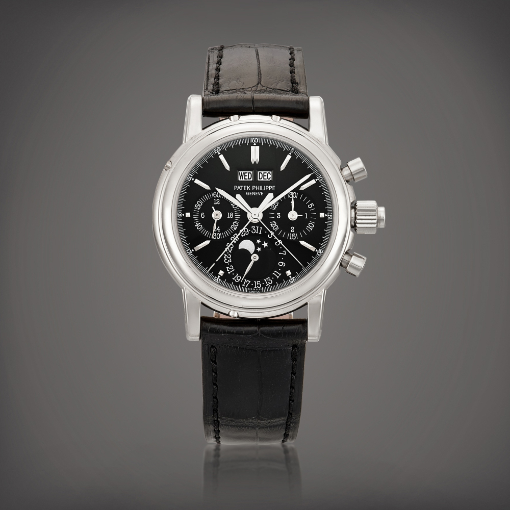 Reference 5004  A brand new white gold perpetual calendar split seconds chronograph wristwatch with moon phases 24 hours and leap year indication Made in 2009    5004  242009