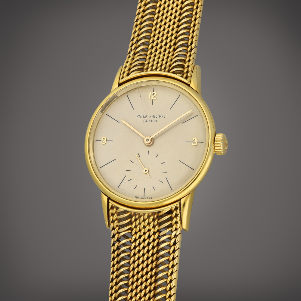 Patek Philippe Calatrava, Reference 2494 | A yellow gold wristwatch with bracelet | Circa 1960