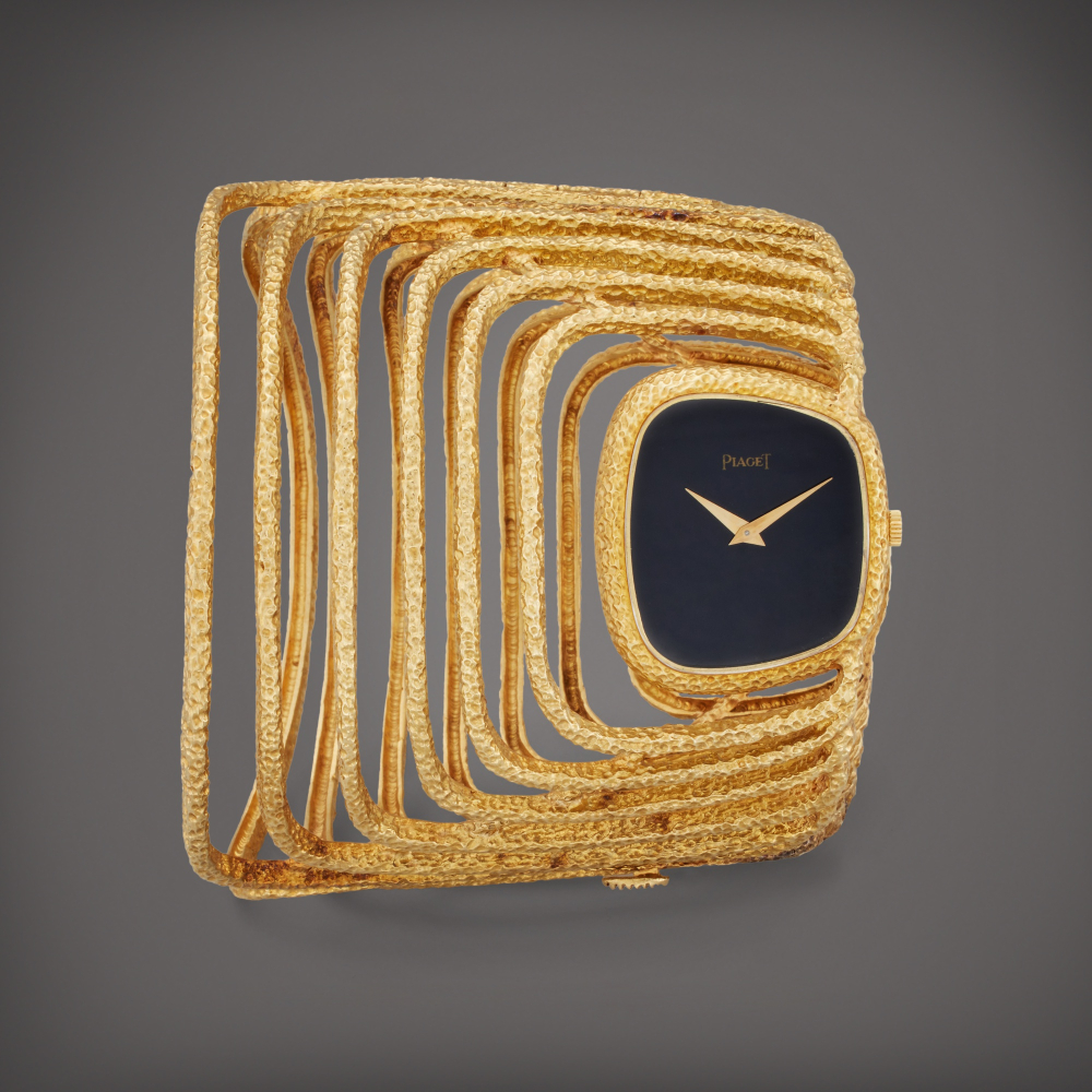 Reference 9467 D 59 | A yellow gold and onyx cuff watch, Circa 1970