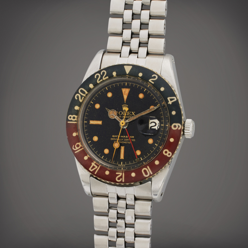 Reference 6542 GMT-Master | A stainless steel automatic dual time wristwatch with date, bracelet, and bakelite bezel, Circa 1956