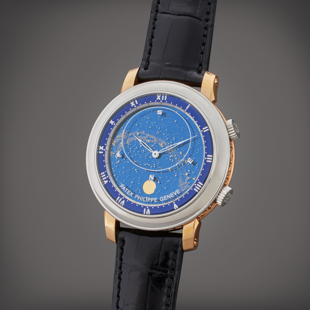 Reference 5102 Celestial | A platinum and pink gold astronomical wristwatch with date, sky chart, phases and position of the moon, and time of meridian passage of sirius and the moon, Circa 2011