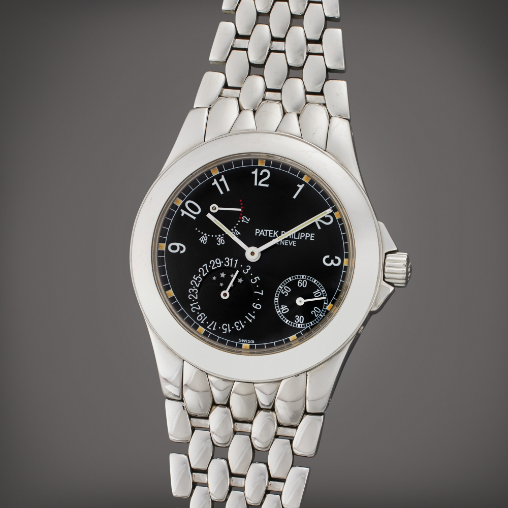 Patek Philippe Reference 5085/1A ‘Neptune’ | A stainless steel automatic bracelet watch with date, moon phases, and power reserve indication, Circa 2002
