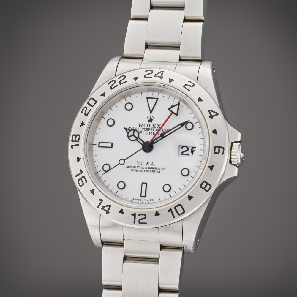 Rolex Reference 16570 Explorer II | Retailed by Van Cleef & Arpels: A stainless steel automatic dual time wristwatch with date and bracelet, Circa 1995