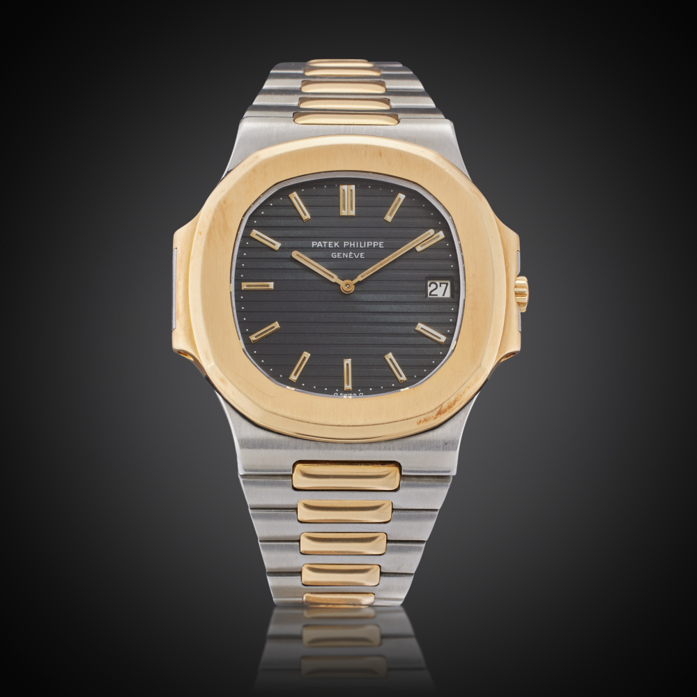Patek Philippe Reference 3700/11 ‘Jumbo’ Nautilus | A stainless steel and yellow gold automatic wristwatch with date, bracelet and original cork presentation box, Owned and Worn by Tom Brady, Made in 1982