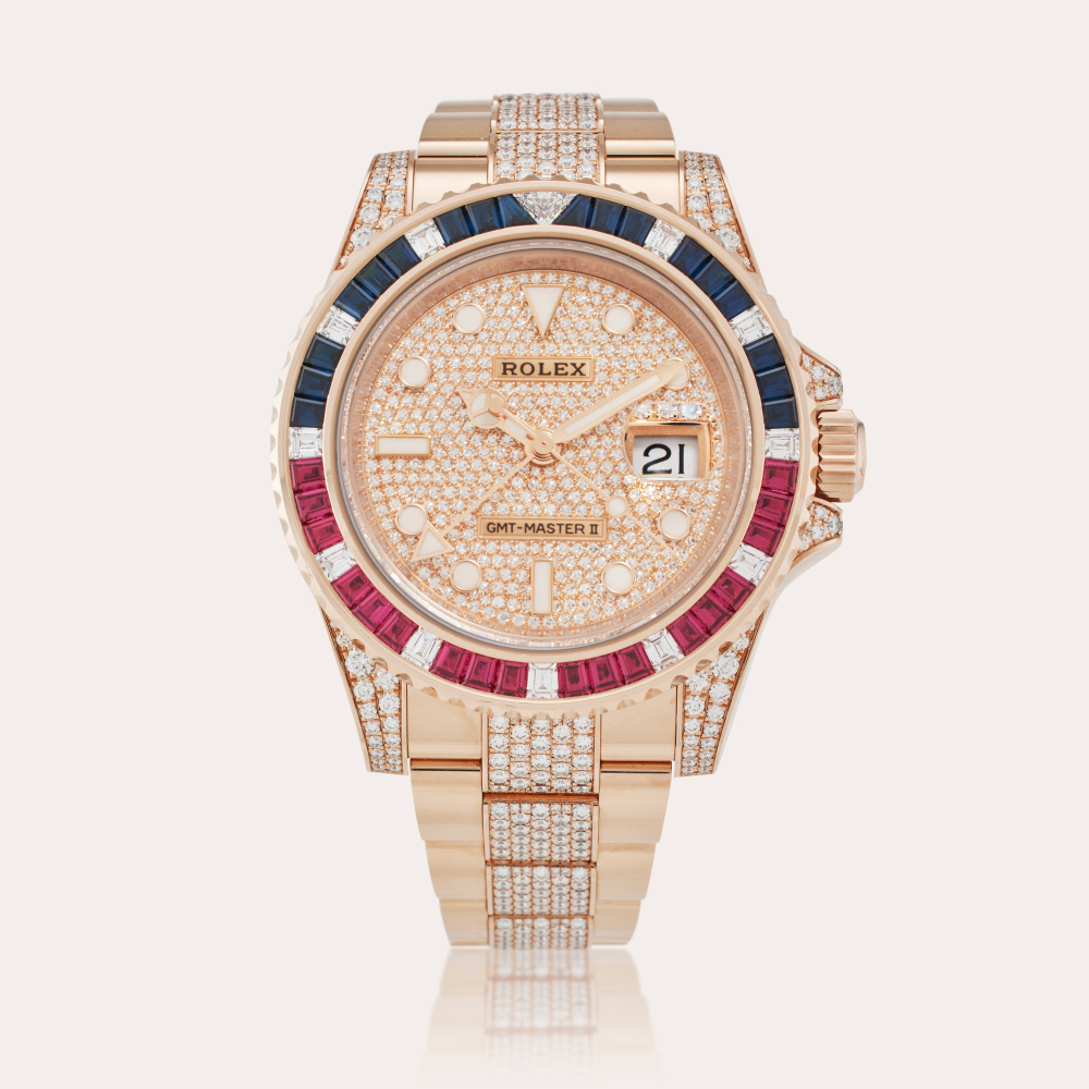 Rolex Reference 126755SARU GMT-Master II | A pink gold, diamond, sapphire, and ruby-set automatic dual time wristwatch with date and diamond-set bracelet, Circa 2021