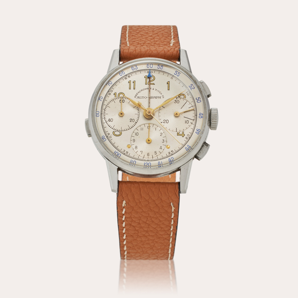 PROPERTY FROM THE COLLECTION OF JEFF STEIN Heuer Auto-Graph | Retailed by Abercrombie & Fitch Co.: A stainless steel chronograph wristwatch, Circa 1953