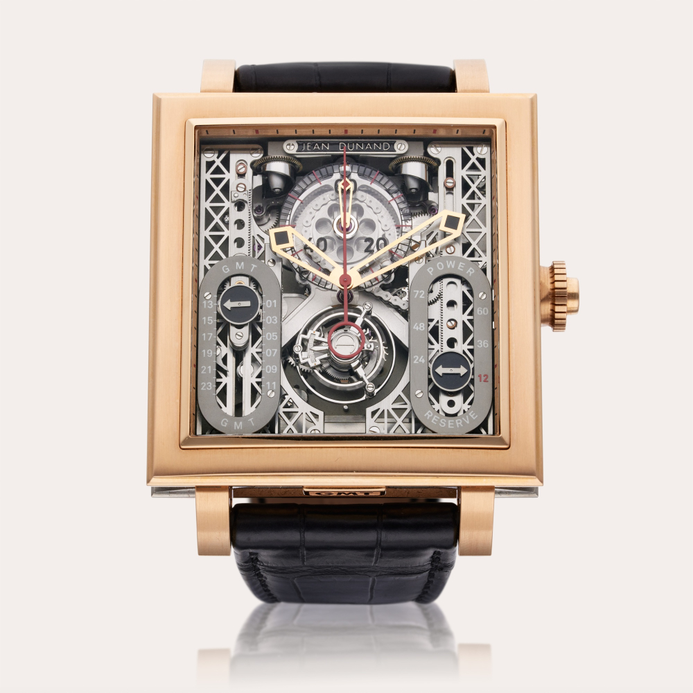 Jean Dunand Reference 5100 Palace | A unique pink gold skeletonized dual time monopusher chronograph tourbillon wristwatch with power reserve indication, Circa 2010