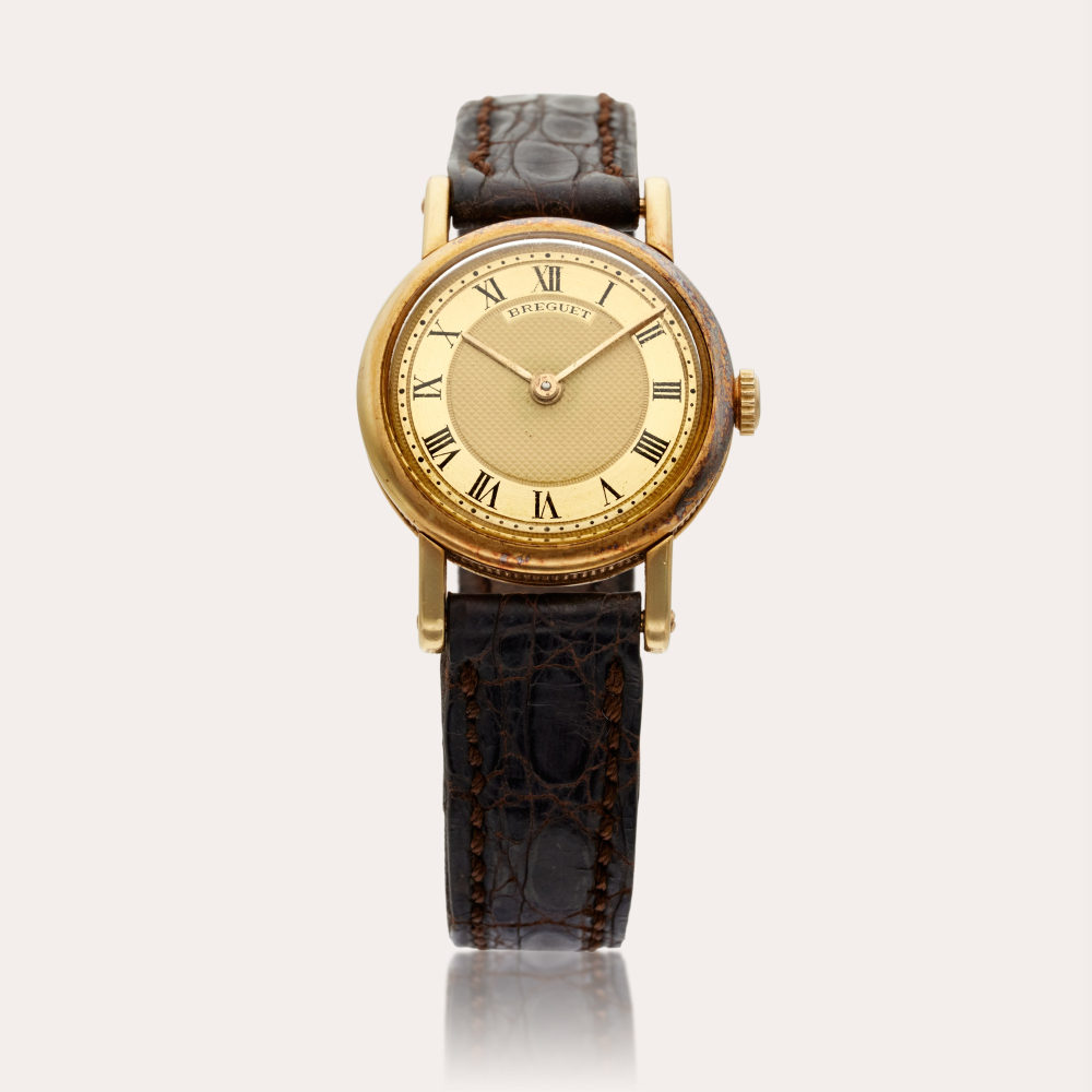 Breguet Retailed by Chaumet: A yellow gold watch, Circa 1960
