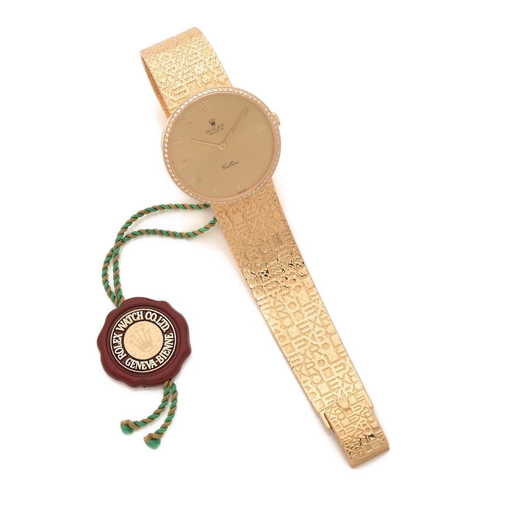 ROLEX CELLINI JUBILEE REF - 5134/8 A 18K gold and diamond manual winding lady's watch by Rolex, circa 1988.With box, Rolex service p...