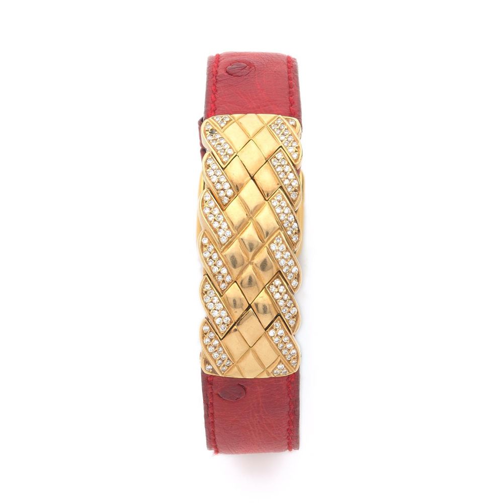 ALEXIS BARTHELAY A gold 18K and diamond quartz lady's watch by Alexis Barthelay.