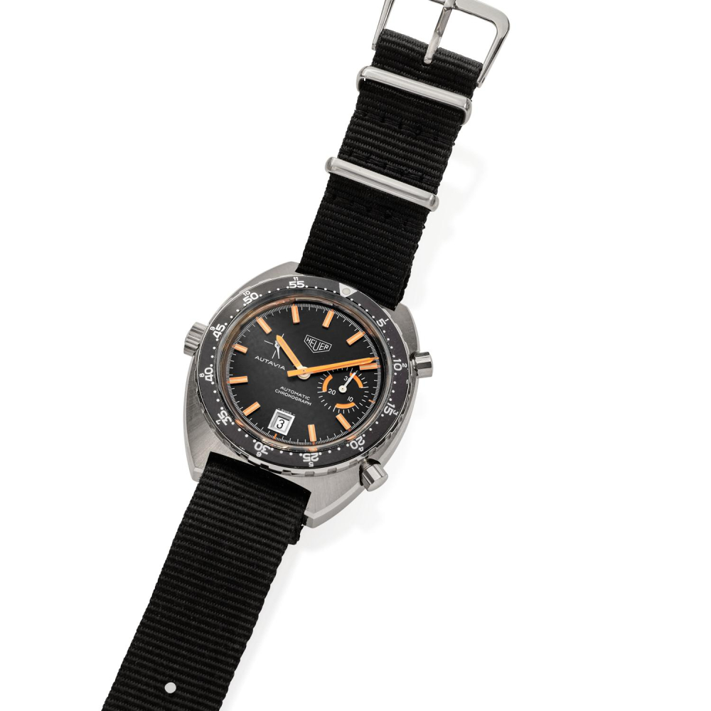 HEUER AUTAVIA. REF. 1563. ANNEES 70 Montre Bracelet En Acier Sur Nato Avec Chronographe. BOITIER : Tonneau, Fond Vissé, Lune...